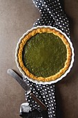 Green tea vegetarian pie match with nuts and mint