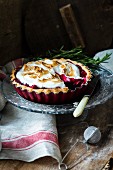 Cherry pie with meringue and rosemary