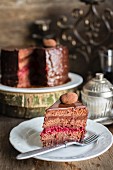 A chocolate truffle cake with cherry jam filling