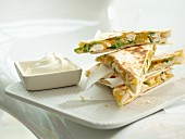 Tortilla sandwiches with chicken and cheese