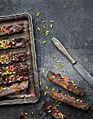 Chocolate cake with cookies, goji berries and pistachios