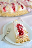 Red currant cake with meringue and almond flakes