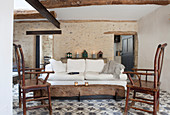 Patterned tiled floor in Mediterranean living room