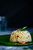 South Indian Breakfast Dish, Ven Pongal served with Sambar and Coconut Chutney