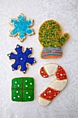 Five colourful decorated Christmas biscuits