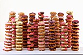 Different doughnut varieties stacked in towers