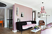 Pink partition wall with niches in living room