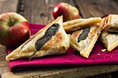 Apple turnovers with sage leaves