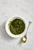Pesto alla Genovese in a small bowl (seen from above)