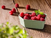 Raspberries in a paper punnet