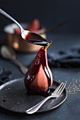 Poached pear in port wine with spices