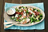 Broccoli and grean peas salad with blue cheese and crispy bacon