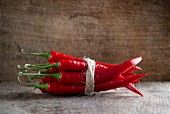 Fresh red chilli peppers, tied in a bundle
