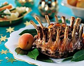 A crown roast in a festive table setting