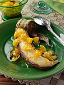 A grilled banana with carmelised orange sauce