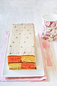 Battenberg cake with marzipan and edible silver beads