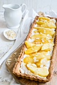 Caramelised apple tart with flaked almonds