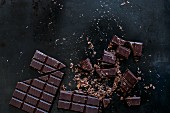 Whole and chopped squares of chocolate