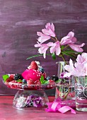 A birthday berry dessert in a hand-painted glass dish