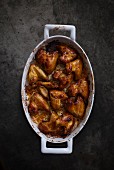 Roast chicken wings in a roasting tin