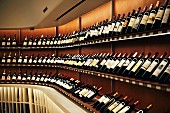 Shelves of wine at 'Vintry Fine Wines' on the northern edge of Battery Park, Downtown Manhattan, New York, USA
