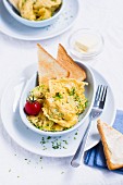 Scrambled eggs with chives and toast