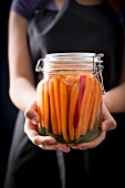 Preserved carrots in a glass jar