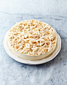 Cheesecake made with coconut milk and decorated with toasted coconut