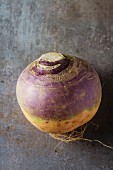 Ripe purple turnips with green leaves