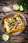 Elotes (corn on the cob with melted cheese, Mexico)