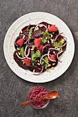 Beetroot carpaccio with raspberries and red onions