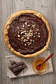 Chocolate tart with hazelnuts and honey