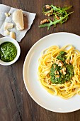 Bavette pasta with rocket pesto and walnuts