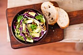 Vegan salad (einkorn, red cabbage, iceberg lettuce, lamb's lettuce, cucumber sticks)