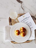 Mustard cheddar gougeres in a French restaurant