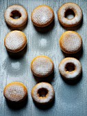 Various donuts with powdered sugar