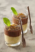 Banana jelly with chocolate sauce in dessert glasses