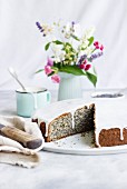 Piegusek (poppy seed cake, Poland) with a sugar glaze, sliced