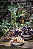 Gooseberry water with grapes and rosemary in a caraffe