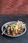 Lentil curry with grilled halloumi and flatbread