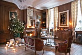 Christmas tree, antique furniture and open fire