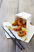Deep fried octopus in a takeaway box