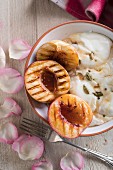 Grilled peaches with maple syrup and cardamom on Greek yogurt