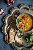 Spicy butternut squash soup with sumach, coriander and pomegranate seeds