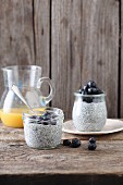 Chia pudding with blueberries in glass jars