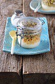 Lentil salad with celery cream in a glass jar