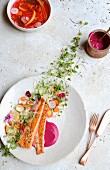Trout fillets with pickled vegetables and beetroot cream