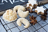 Wafer biscuits with a coconut crust, a vanilla dip, cinnamon star and star anise