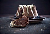 A vegan chocolate and almond gugelhupf with coffee cream frosting