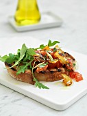 Bruschetta with tomatoes and rocket